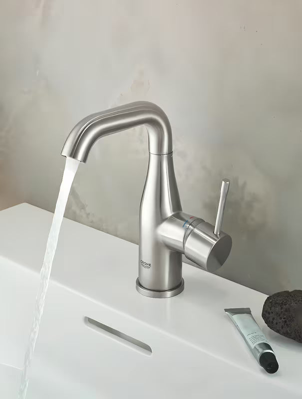 Umyvadlová páková baterie Grohe Essence New s výpustí v provedení supersteel.