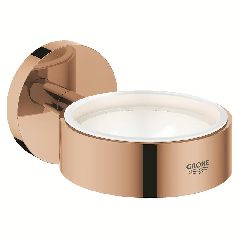 Kovový držák Grohe Essentials v povrchové úpravě warm sunset se skrytým upevněním.