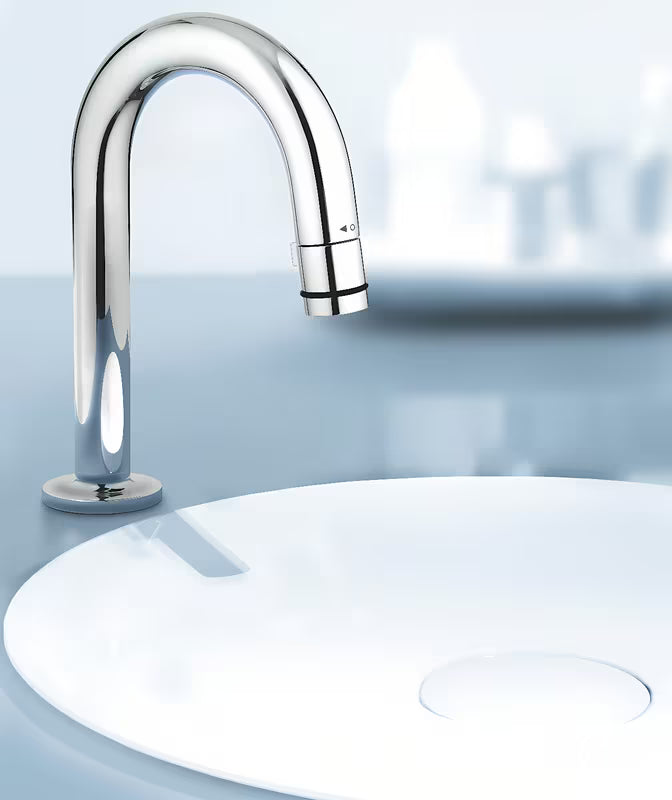 Chromový umyvadlový ventil Grohe Universal s výpustí ve tvaru C a funkcí start/stop