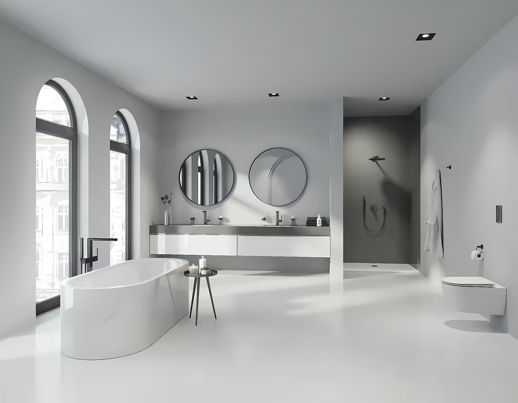Nástěnný držák sprchy Grohe Rainshower s kulatou rozetkou v povrchové úpravě Brushed Hard Graphite.