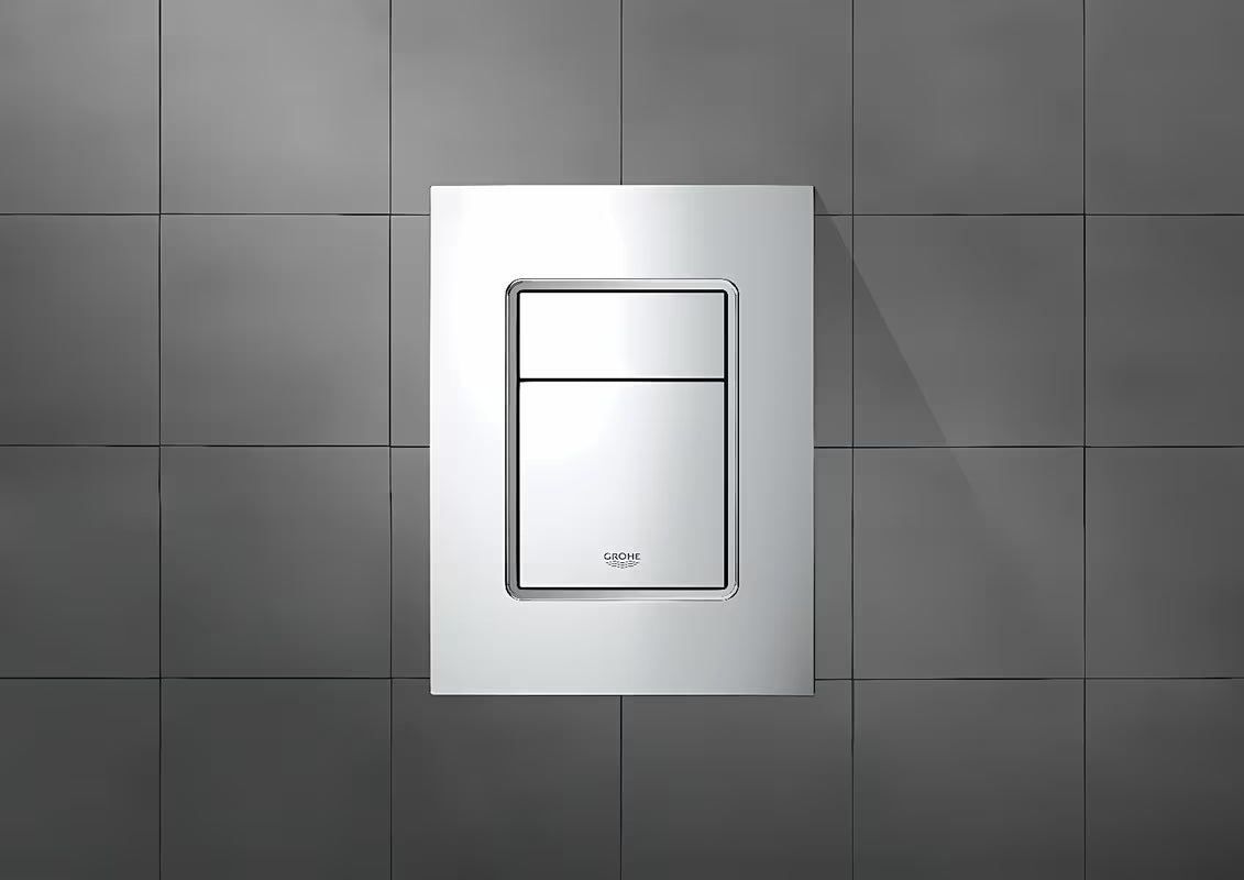 Chromové splachovací tlačítko Grohe Skate Cosmopolitan S pro podomítkové nádrže s duálním splachováním.
