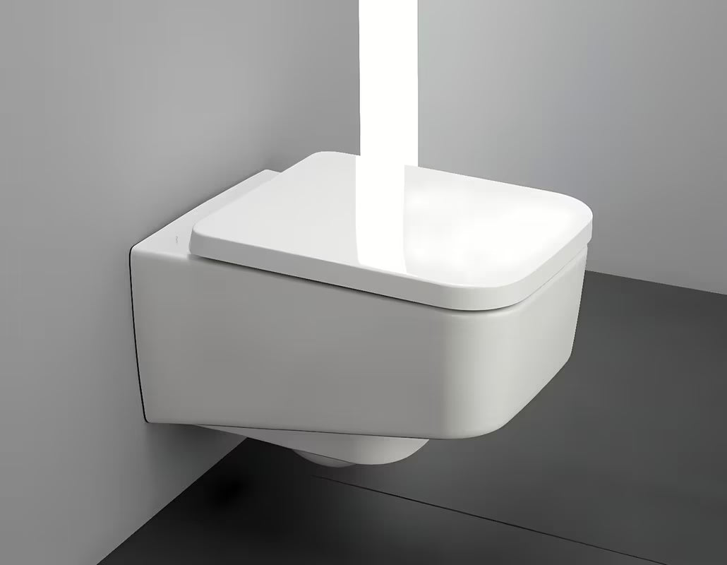 Bílé závěsné WC Laufen Pro S s bezokrajovým provedením bez splachovacího okruhu a hranatým designem.