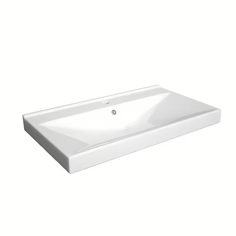 Bílé keramické nábytkové umyvadlo Naturel Stilla s hranatým designem pro instalaci na koupelnový nábytek.