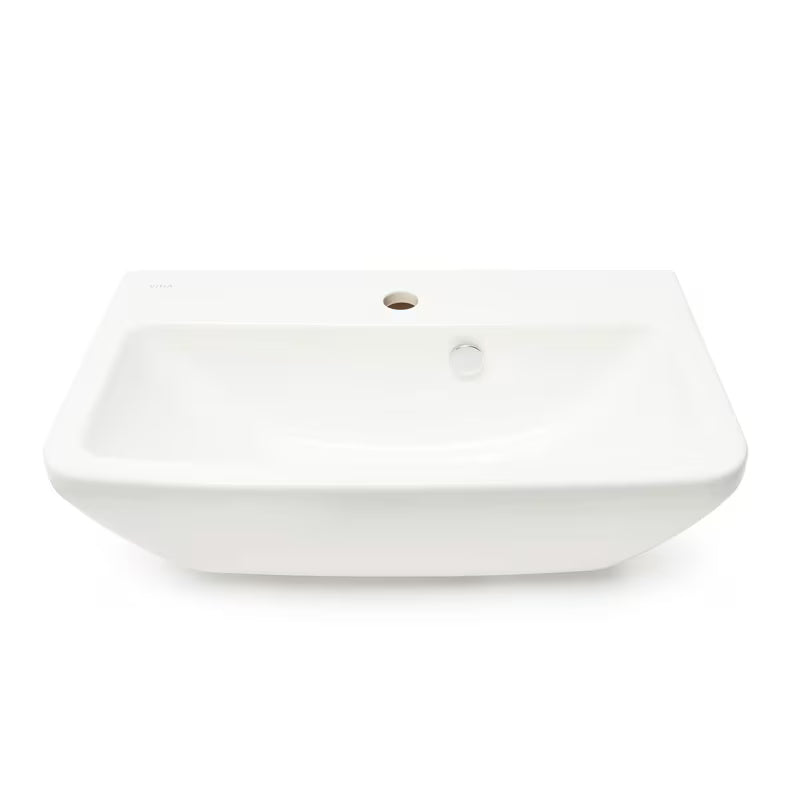 Bílé závěsné umyvadlo Vitra Integra 60x36 cm z keramiky s otvorem pro baterii uprostřed a přepadem.