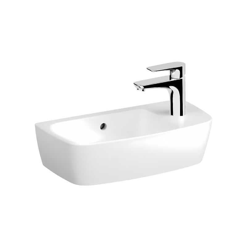 Bílé keramické umyvadlo na desku Vitra Shift New 50 x 25 cm s přepadem a otvorem pro baterii vpravo.