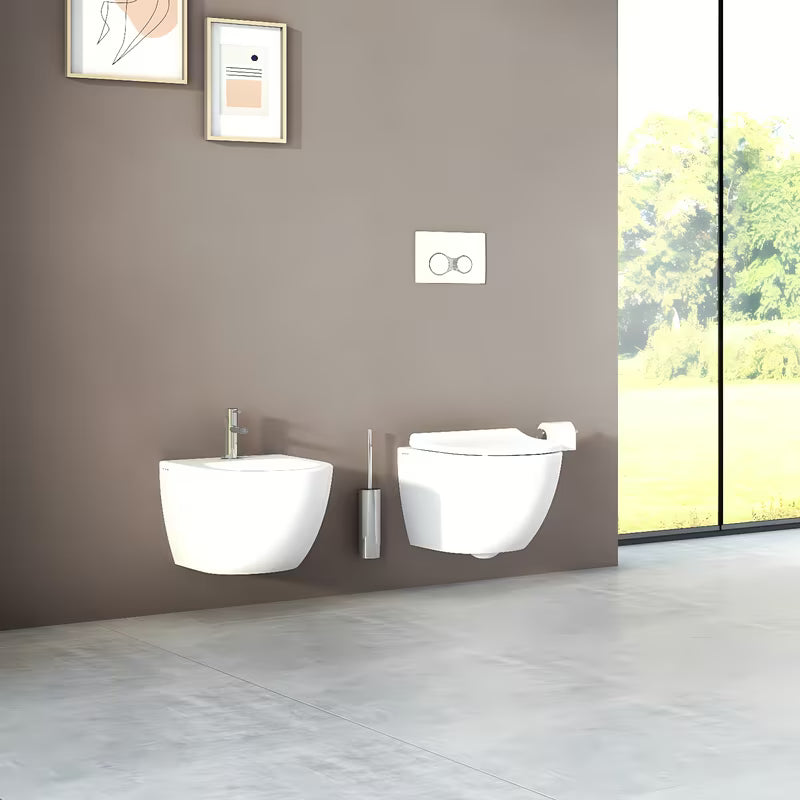 Bílé závěsné WC VitrA Shift bez splachovacího okruhu se skrytým uchycením a oblým tvarem.