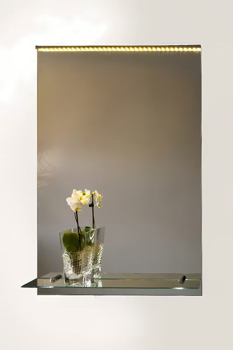 Obdélníkové nástěnné zrcadlo Amirro Orion 50x70 cm s Led osvětlením a poličkou, orientace na výšku.