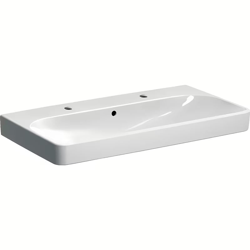 Bílé závěsné umyvadlo Geberit Smyle Square 90x48 cm ze sanitární keramiky se dvěma otvory pro baterii.
