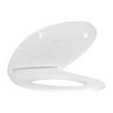 Bílé WC sedátko Grohe Bau Ceramic s víkem, SoftClose sklápěním a rychlým uvolněním pro snadné čištění.