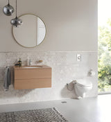 Manuální bidetové sedátko Grohe Bau Ceramic z duroplastu s funkcí SoftClose v barvě alpine-white.