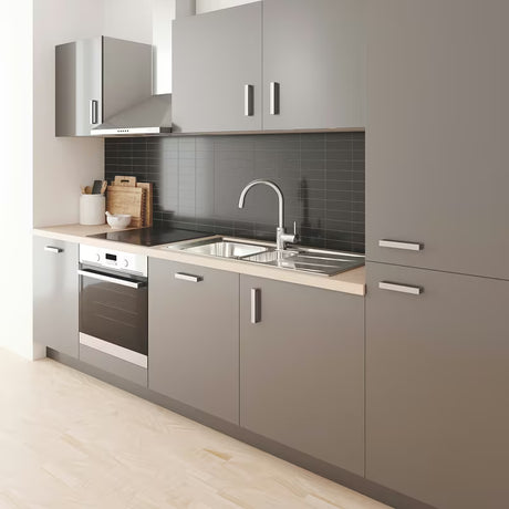 Chromová dřezová baterie Grohe Concetto New s vysokou otočnou výpustí a vytahovací sprškou.