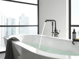 Podlahová vanová baterie Grohe Essence New se sprchovým setem v povrchové úpravě Hard Graphite.