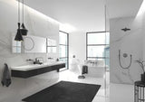 Kovový koupelnový háček Grohe Essentials v provedení Brushed Hard Graphite se skrytým upevněním.