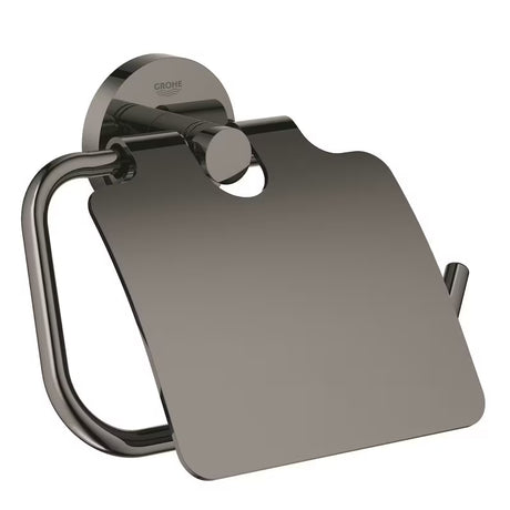 Držák toaletního papíru Grohe Essentials s krytem v provedení hard graphite se skrytým upevněním.