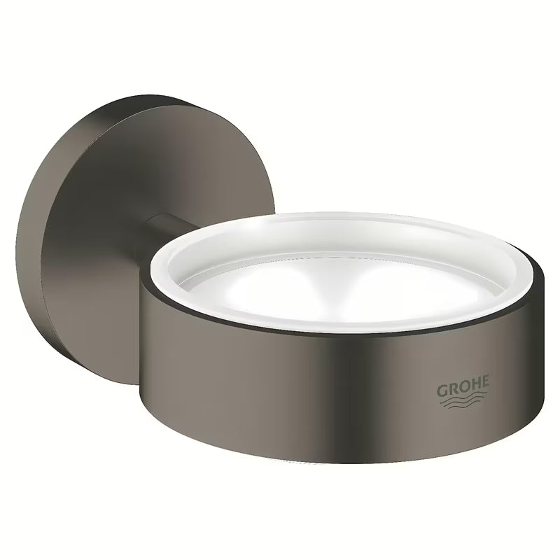 Držák Grohe Essentials pro mýdlenku nebo sklenici v provedení Brushed Hard Graphite se skrytým upevněním.