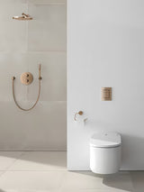 Držák toaletního papíru Grohe Essentials bez krytu v povrchové úpravě warm sunset se skrytým upevněním