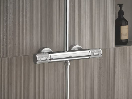 Chromový sprchový systém Grohe Euphoria System s termostatickou baterií, hlavovou a ruční sprchou