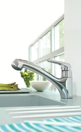 Chromová dřezová baterie Grohe Eurodisc s vytahovací sprškou a otočnou výpustí