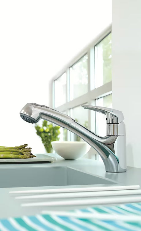 Chromová dřezová baterie Grohe Eurodisc s vytahovací sprškou a otočnou výpustí