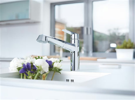 Chromová dřezová baterie Grohe Eurodisc Cosmopolitan s vytahovací sprškou a otočnou výpustí