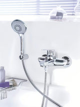 Chromová nástěnná vanová baterie Grohe Eurodisc se sprchovým setem