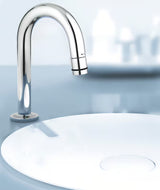 Chromový umyvadlový ventil Grohe Universal s výpustí ve tvaru C a funkcí start/stop