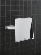 Kosmetické zrcátko Grohe Selection Cube v chromu s 3× zvětšením a nástěnnou montáží se skrytým upevněním.