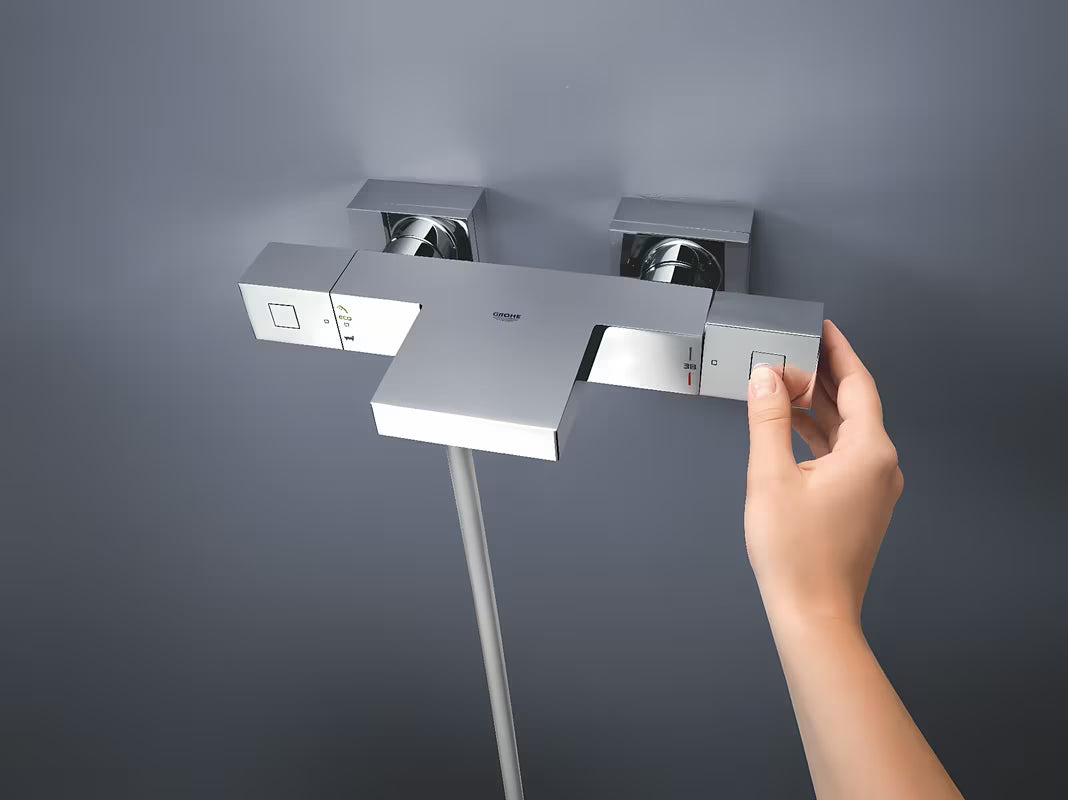 Chromová termostatická vanová baterie Grohe Grohtherm Cube s XL výpustí GROHE XL Waterfall pro vanu i sprchu.