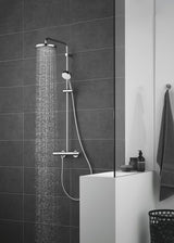 Chromová hlavová sprcha Grohe New Tempesta 210 s proudem Rain a technologiemi DreamSpray a SpeedClean.