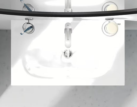 Umyvadlová páková baterie Grohe Plus v provedení supersteel s otočnou výpustí a odtokovou soupravou.