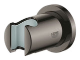 Pevný nástěnný držák ruční sprchy Grohe Rainshower neutral s kruhovou rozetkou v povrchu Hard Graphite.