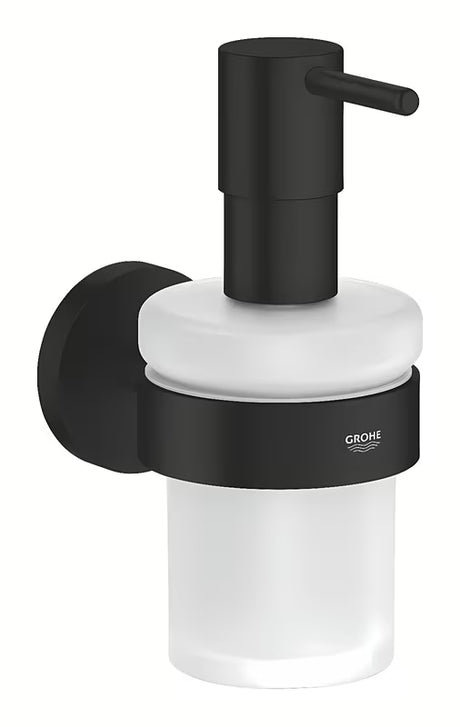 Matně černý dávkovač mýdla Grohe Start se skrytým upevněním na stěnu.
