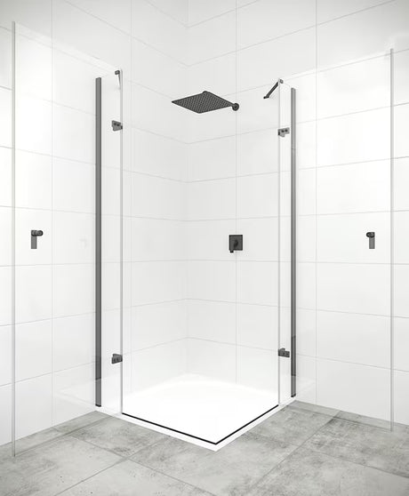 Čtvercový sprchový kout Hüppe Strike New 90x90 cm s čirým sklem a profily v matné černé barvě.