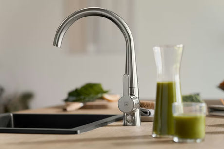Hansa Designo páková stojánková dřezová baterie s otočným ramínkem v provedení broušená ocel