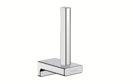 Chromový nástěnný držák na rezervní toaletní papír hansgrohe AddStoris s kovovým tělem a zakrytým upevněním.