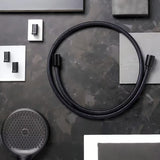 Textilní sprchová hadice hansgrohe Designflex 2 m v matně černé barvě s univerzálním připojením G ½.