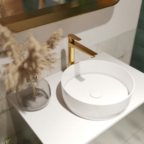 Vysoká umyvadlová baterie Hansgrohe Talis E v povrchu Cool Sunrise se vzhledem leštěného zlata s výpustí