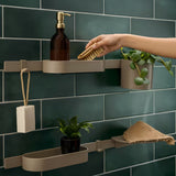 Béžová sprchová polička hansgrohe WallStoris Planet Edition pro uložení šamponu a sprchových potřeb