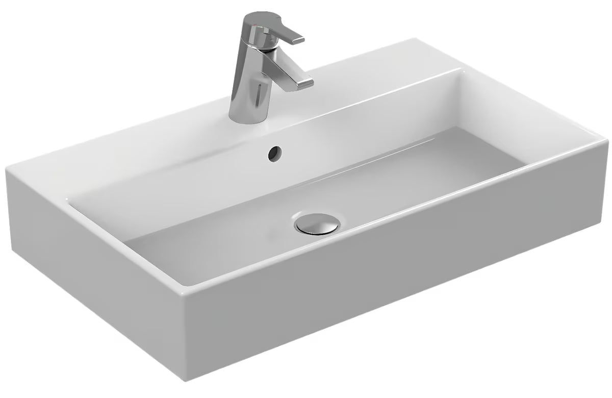 Bílé keramické závěsné umyvadlo Ideal Standard Strada 71x42 cm s otvorem pro baterii uprostřed.
