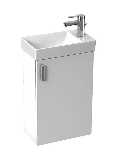 Bílá závěsná skříňka Jika Petit s keramickým umyvadlem v minimalistickém provedení