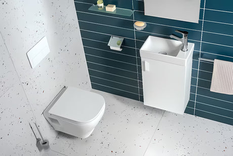 Bílá závěsná skříňka Jika Petit s keramickým umyvadlem v minimalistickém provedení