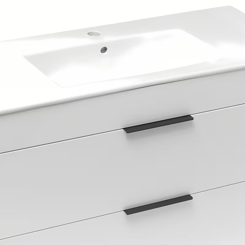 Bílá závěsná skříňka Jika Plan s keramickým umyvadlem a plnovýsuvnými zásuvkami