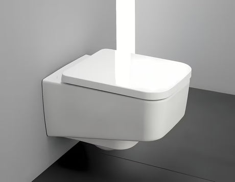 Bílé WC sedátko Laufen Pro z duroplastu s poklopem a technologií SoftClose pro pomalé sklápění.