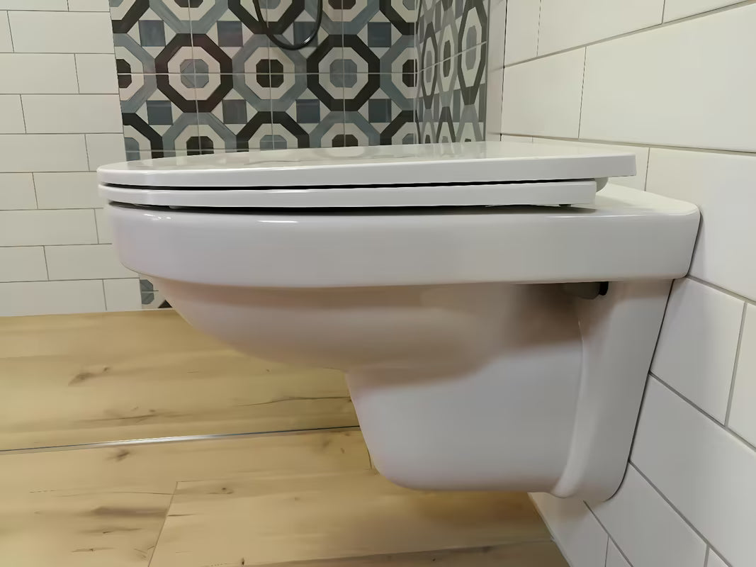 Bílé závěsné WC Laufen Pro Nordic bez splachovacího okruhu s úsporným splachováním 2/4 l