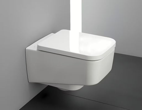 Bílé závěsné WC Laufen Pro S s bezokrajovým provedením bez splachovacího okruhu a hranatým designem.