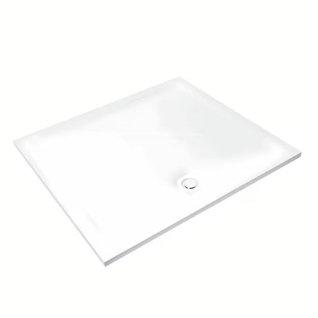 Bílý designový sifon k sprchové vaničce s krytkou, který nevyčnívá nad povrch vaničky.