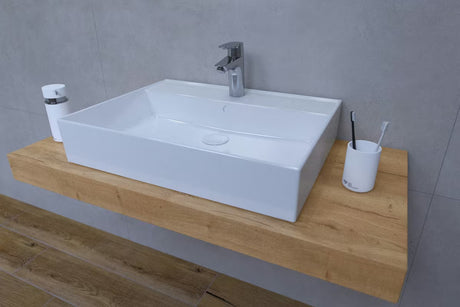 Koupelnová sestava Naturel Dolce 100x50 cm v dekoru dub halifax s umyvadlem na desku a chromovou baterií.