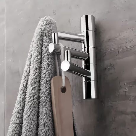 Chromový trojitý otočný háček Nimco Bormo do koupelny s jednoduchým designem.