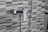 Nástěnná páková sprchová baterie Optima Cube Way v chromovém provedení s oblým moderním designem.