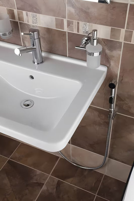 Chromová umyvadlová baterie Paffoni Birillo s bidetovou sprškou a přepínačem proudu vody.